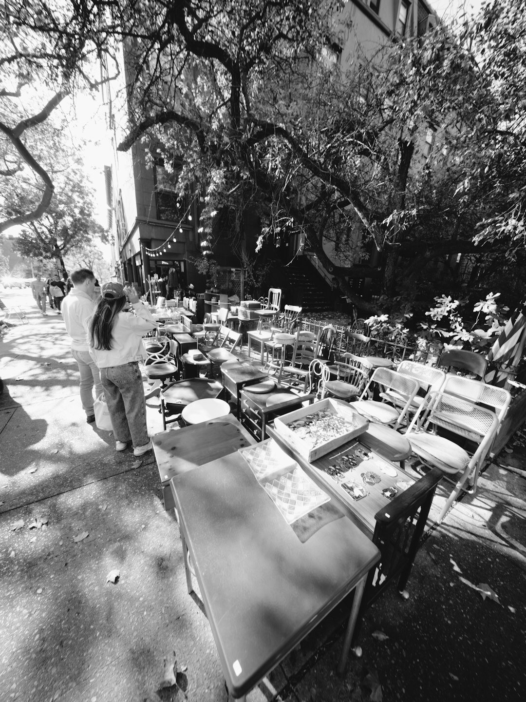 Senior volunteers organizing chairs for a community event