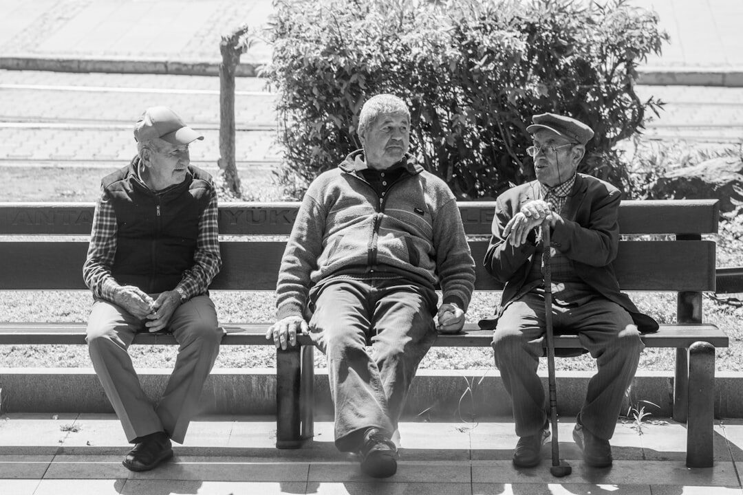 elderly friends chatting outdoors